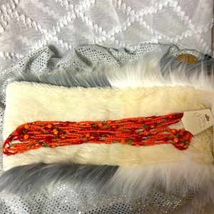 Orange and green beaded necklace.